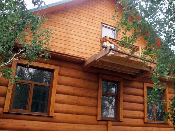 отделка фасада деревянного дома